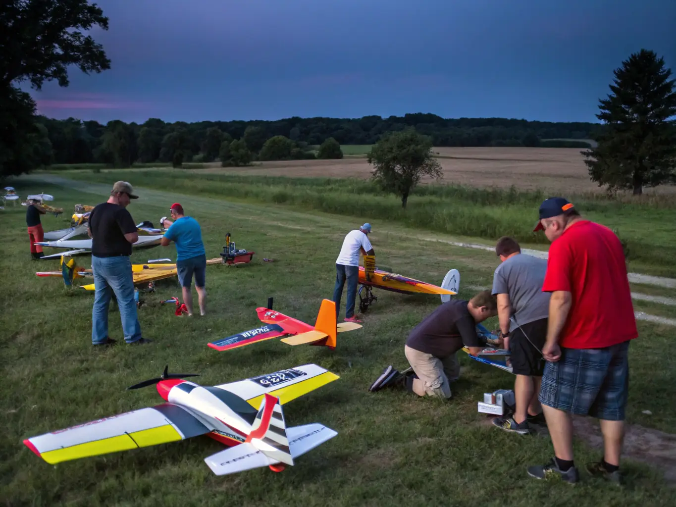 A group of CD'ULM12 members gathered at the aerodrome, preparing their ultra-light aircraft for a recreational flight, showcasing the camaraderie and shared passion for aviation.